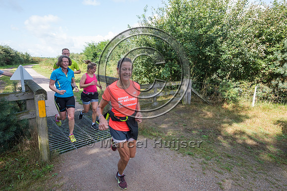 Runners on trail at ecoduct Natuurbrug Zanderij Crailoo, The Net