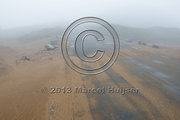 Warning sign, caution sand draft, on road, Point Reyes National Seashore, California, USA