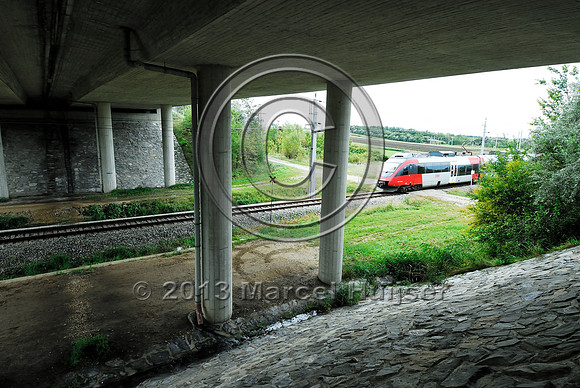 Railroad and farm road at multifunctional underpass, under A4 motorway, Parndorf, Austria