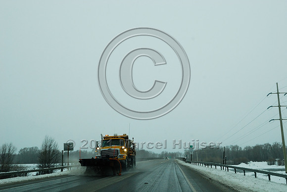 Snowplow on road, WY